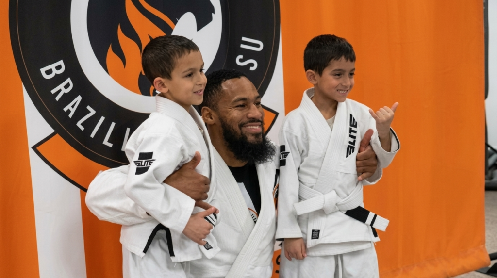 Coach Anthony Terrell with two of his students